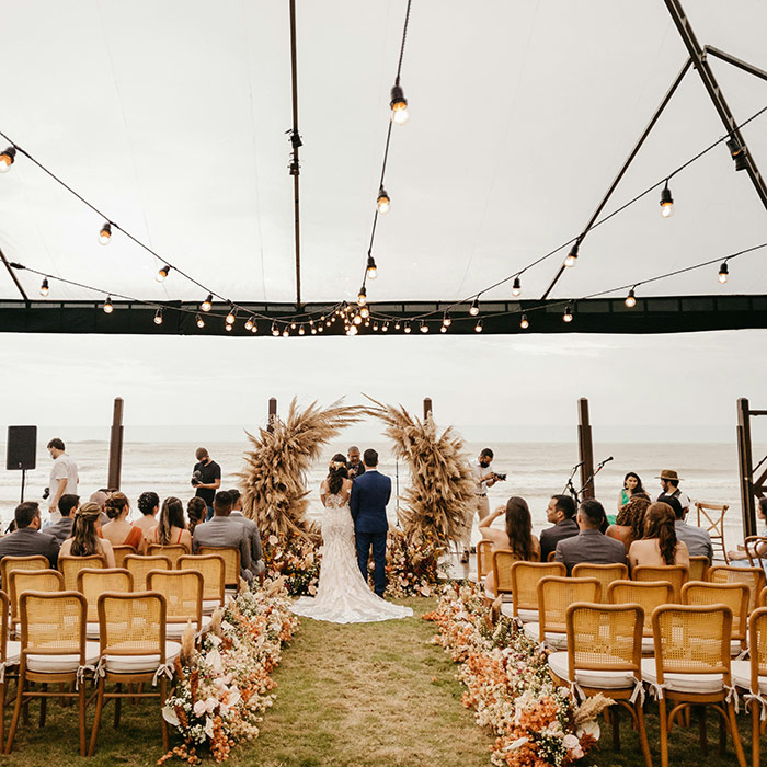 Clear tent with string lights set up for reception